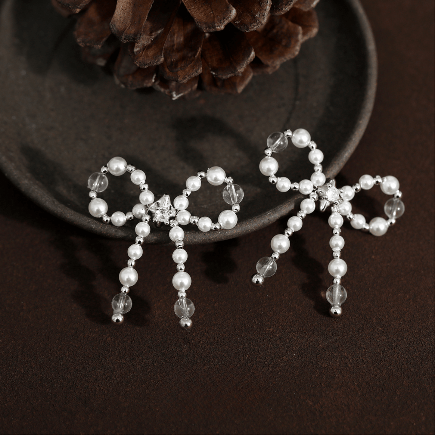 Boucles d'oreilles en argent sterling avec nœud papillon et perles