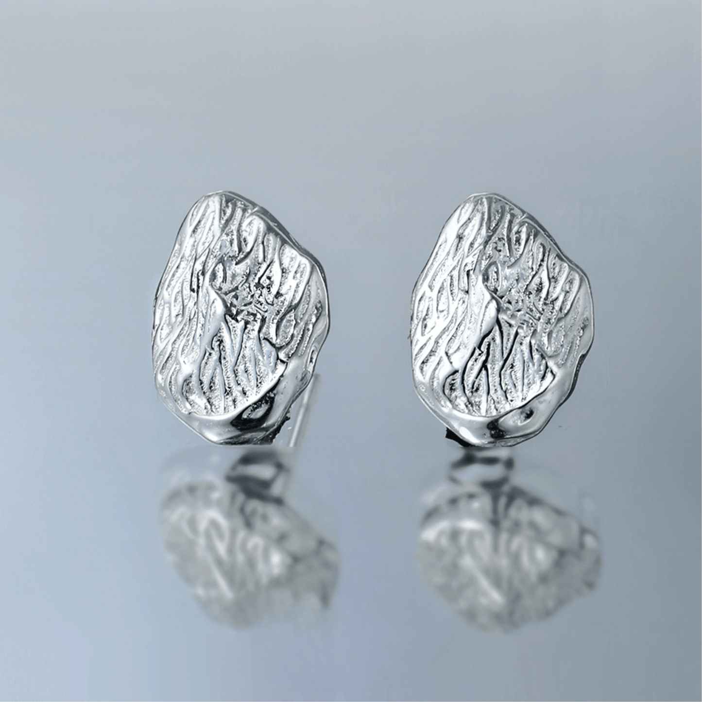 Textured Almond Earrings – Sculpted Silver Pods